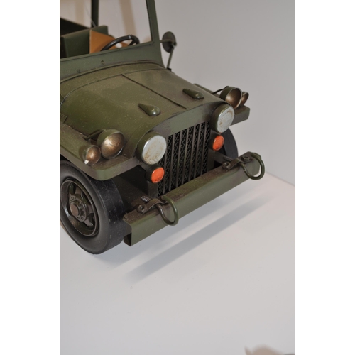 181 - Metal ornament of army style Jeep vehicle, approx. size  L 11