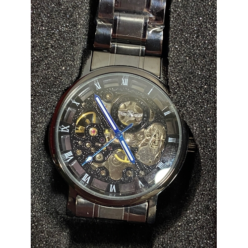 31 - A group of various wristwatches in various designs, all as new condition with protective film, boxes... 