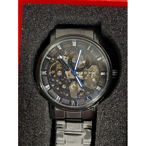 31 - A group of various wristwatches in various designs, all as new condition with protective film, boxes... 