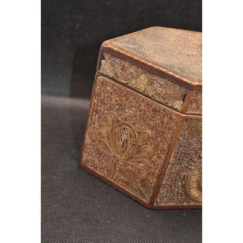 298 - Antique tea caddy with rolled paper scroll work design the tea caddy of heagonal form, poss.late 18t... 