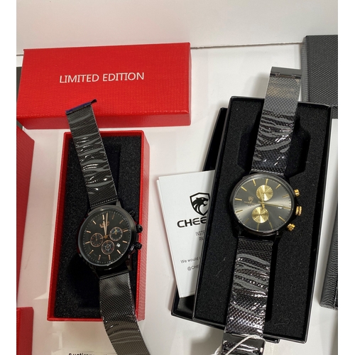 31 - A group of various wristwatches in various designs, all as new condition with protective film, boxes... 