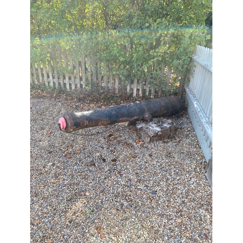 196 - Large antique ship's cannon barrel, GR with carriage wheels and other carriage items. Also included ... 