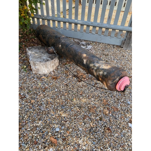 196 - Large antique ship's cannon barrel, GR with carriage wheels and other carriage items. Also included ... 