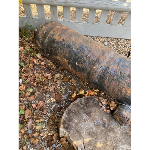 196 - Large antique ship's cannon barrel, GR with carriage wheels and other carriage items. Also included ... 