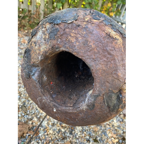 196 - Large antique ship's cannon barrel, GR with carriage wheels and other carriage items. Also included ... 