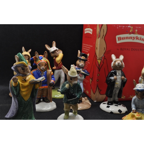 11 - Group of ceramic Bunnykins figurines, some with boxes