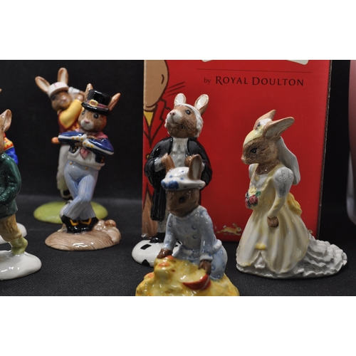 11 - Group of ceramic Bunnykins figurines, some with boxes