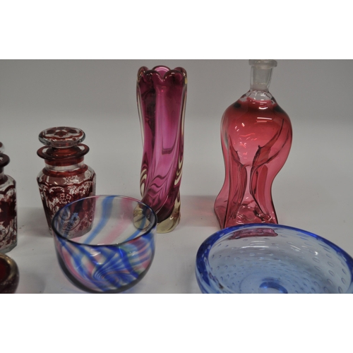 29 - A selection of glassware to include a pair of ruby flash glass pickle jars with vine decoration, a c... 