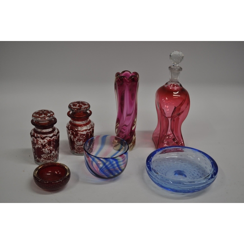 29 - A selection of glassware to include a pair of ruby flash glass pickle jars with vine decoration, a c... 