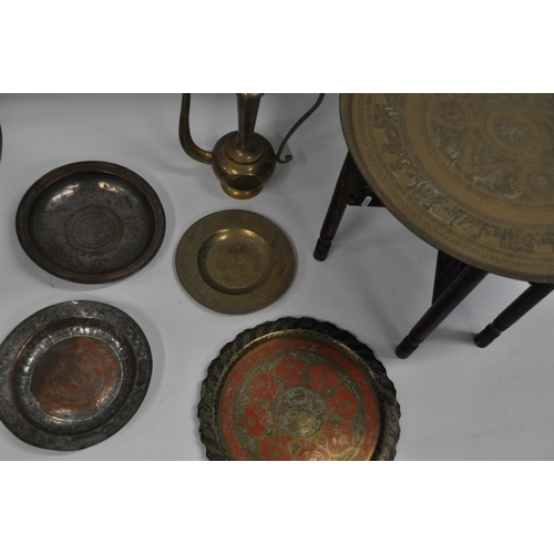 32 - Brass top folding table and other middle Eastern utilitarian metal ware items