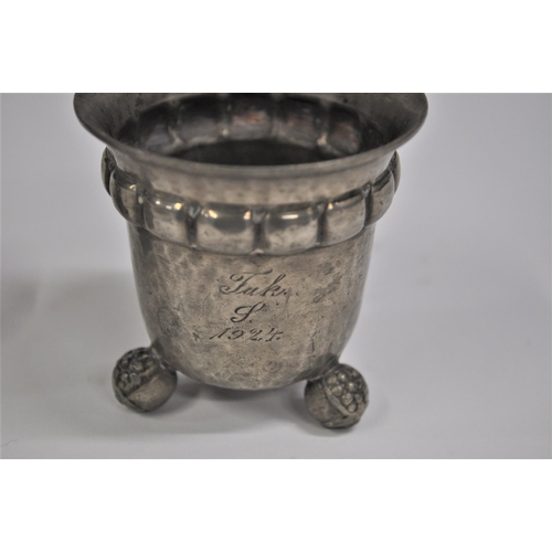 35 - A Danish pewter vase on three decorative feet with an inscription dated 1924 to side, makers stamp E... 