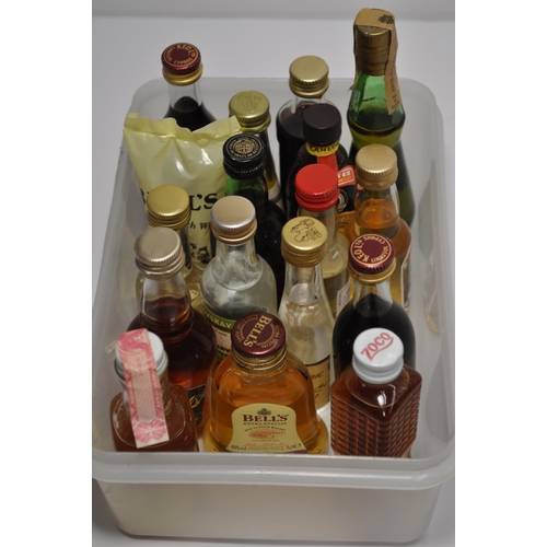 42 - A collection of miniatures including whiskey, bourbon, liqueurs, gins and vodkas etc. (X62 bottles i... 