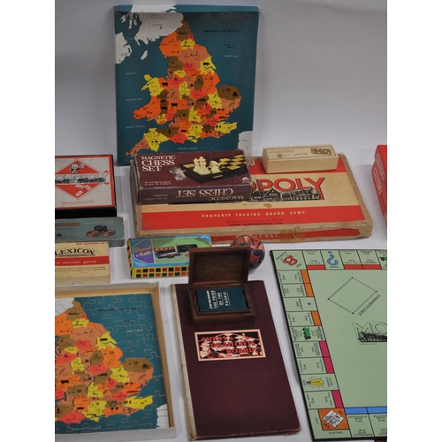 59 - Board games to include vintage Monopoly, Tiddlywinks, and in excess of 70 advertising playing card p... 