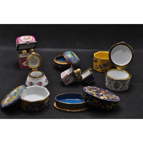 39 - Group of porcelain and enamel trinket boxes of various design, some containing glass bottles, x8 ite... 