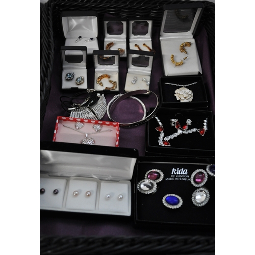 2 - A large quantity of costume jewellery to include necklaces, bracelets, bangles, earrings, rings etc.