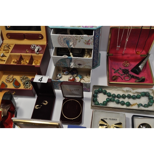 4 - A large quantity of costume jewellery to include bracelets, watches, necklaces, rings etc.