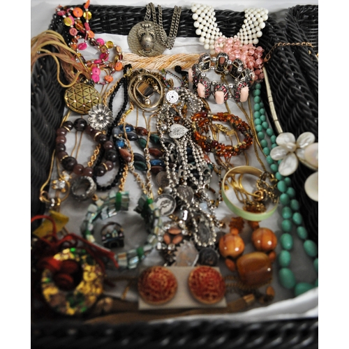 5 - A large quantity of costume jewellery to include necklaces, bracelets, bangles, earrings, rings etc.