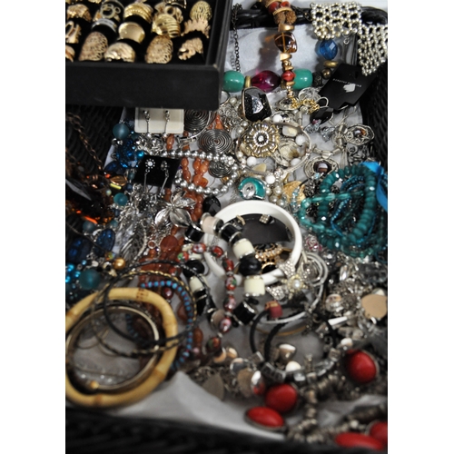 5 - A large quantity of costume jewellery to include necklaces, bracelets, bangles, earrings, rings etc.