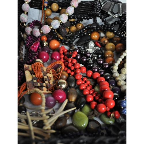 5 - A large quantity of costume jewellery to include necklaces, bracelets, bangles, earrings, rings etc.