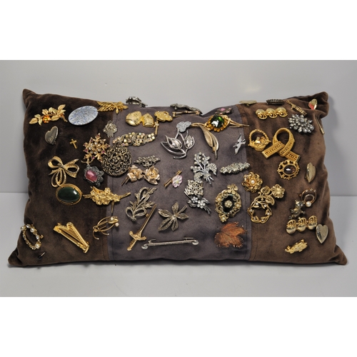 15 - In excess of 140+ pin brooches varying in date,  colours and designs (cushions excluded for display ... 