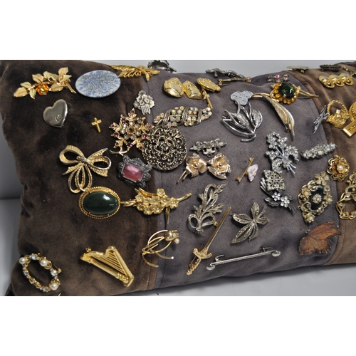 15 - In excess of 140+ pin brooches varying in date,  colours and designs (cushions excluded for display ... 