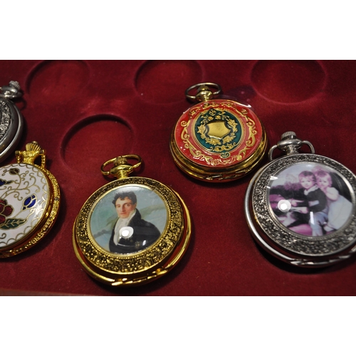 105 - A large quantity of novelty pocket watches (x34) presented in a three drawer display unit measuring ... 