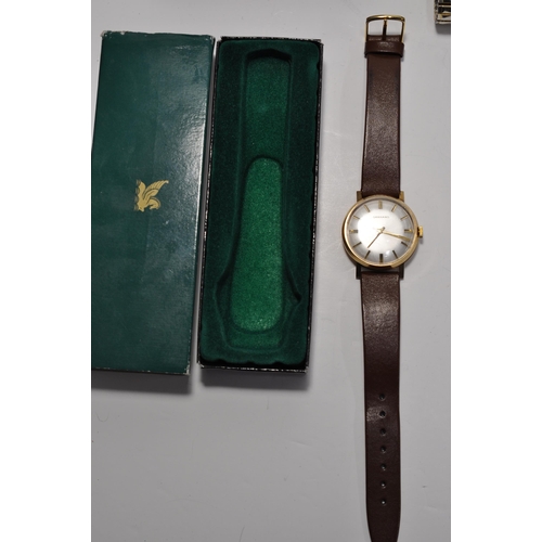 119 - 9ct gold cased Garrard wristwatch, hallmarked London to inside of case with engraving to reverse pre... 