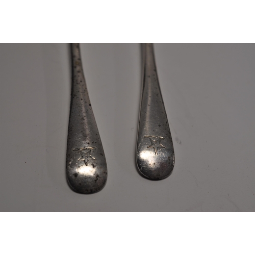 134 - A Pair of silver pepperettes, hallmarked London 1917, makers stamp AC poss. Alfred Clark together wi... 