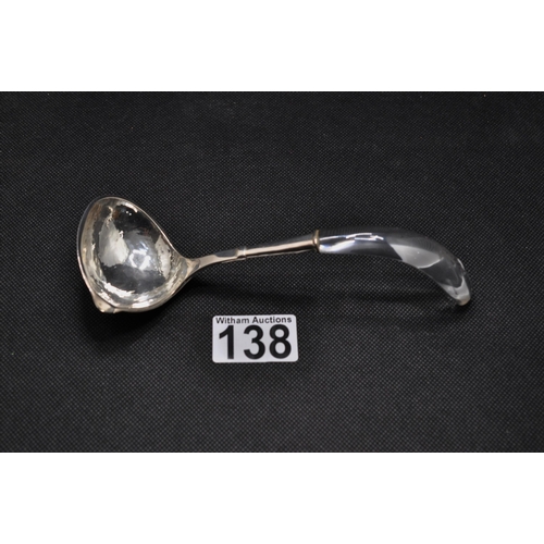 138 - Sauce spoon with hammered design to the bowl leading to clear Perspex handle, stamped 925 to stem, a... 