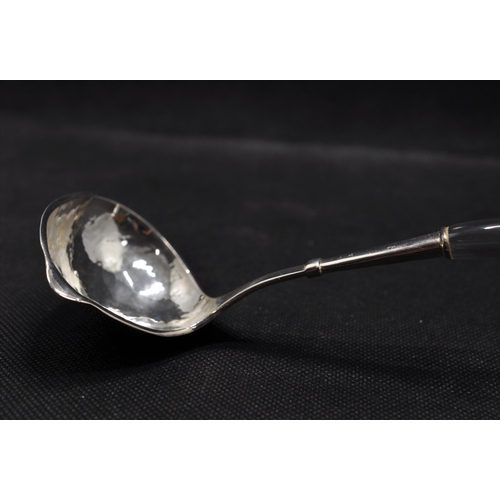 138 - Sauce spoon with hammered design to the bowl leading to clear Perspex handle, stamped 925 to stem, a... 