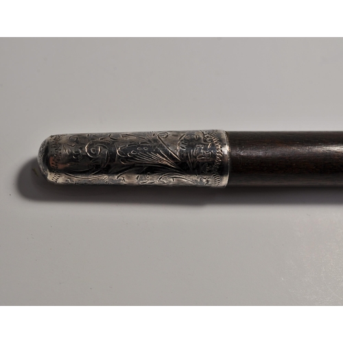 142 - A military  style/ conductor's style baton with silver tip and handle, engraved foliate detailing,  ... 