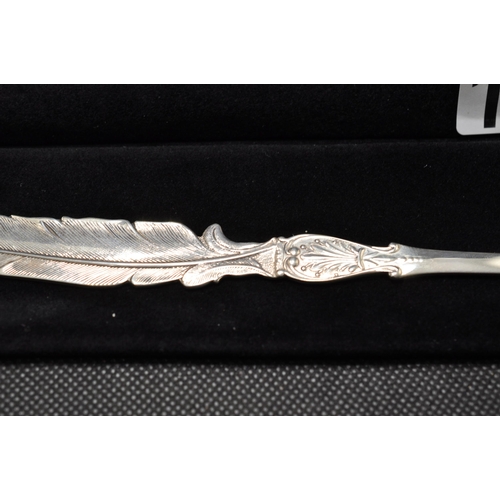 146 - A Dutch silver letter opener in the style of a feather hallmarked Gouda c.1999 together with glass i... 