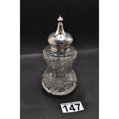 147 - A silver and cut glass sugar sifter by Arthur Cook hallmarked Birmingham c.1903