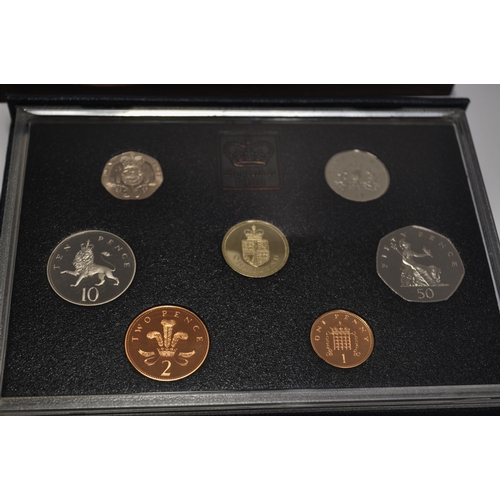 159 - 1988 UK proof coin collection containing x7 coins with box and certificate, Windsor Mint Portraits o... 