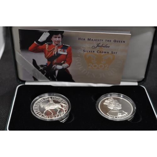 164 - Her Majesty the Queen 2002 Jubilee Silver Crown boxed Set, with literature together with Golden jubi... 