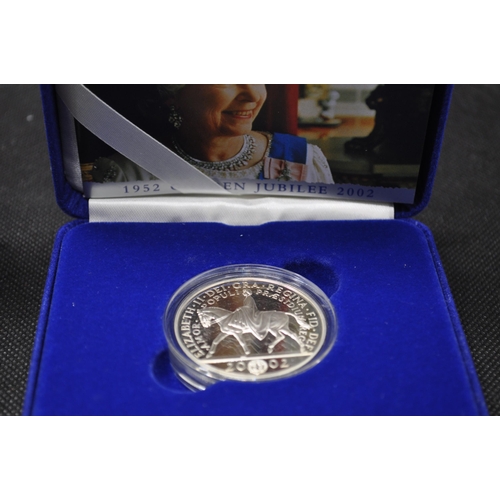 164 - Her Majesty the Queen 2002 Jubilee Silver Crown boxed Set, with literature together with Golden jubi... 