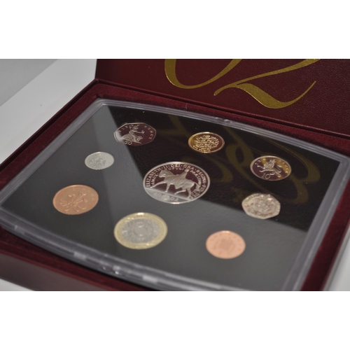 167 - x3 Royal Mint boxed sets; a 1997 UK proof coin collection with certificate which includes a £5 coin ... 