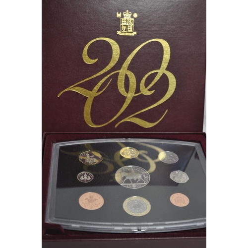 167 - x3 Royal Mint boxed sets; a 1997 UK proof coin collection with certificate which includes a £5 coin ... 