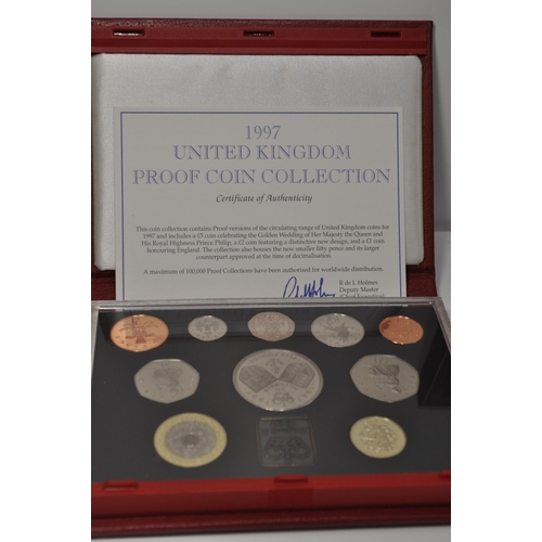 167 - x3 Royal Mint boxed sets; a 1997 UK proof coin collection with certificate which includes a £5 coin ... 