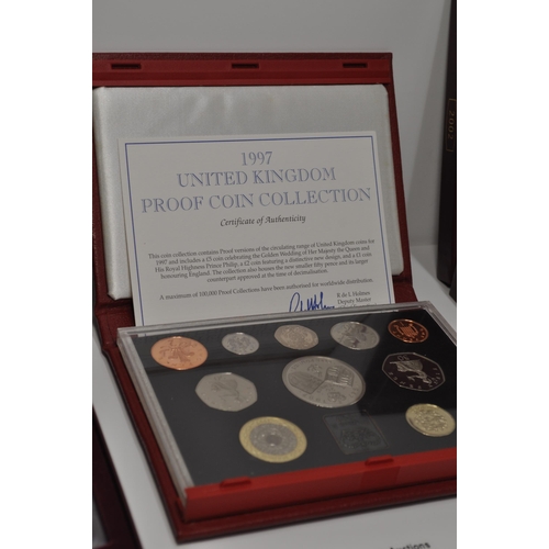 167 - x3 Royal Mint boxed sets; a 1997 UK proof coin collection with certificate which includes a £5 coin ... 