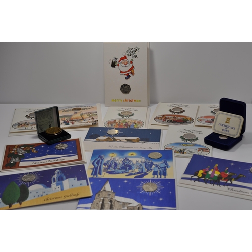 182 - Pobjoy Mint Isle of Man Christmas 50 pence coin inset into original Pobjoy Christmas Card with Pobjo... 