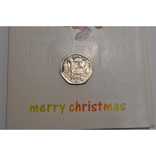 182 - Pobjoy Mint Isle of Man Christmas 50 pence coin inset into original Pobjoy Christmas Card with Pobjo... 