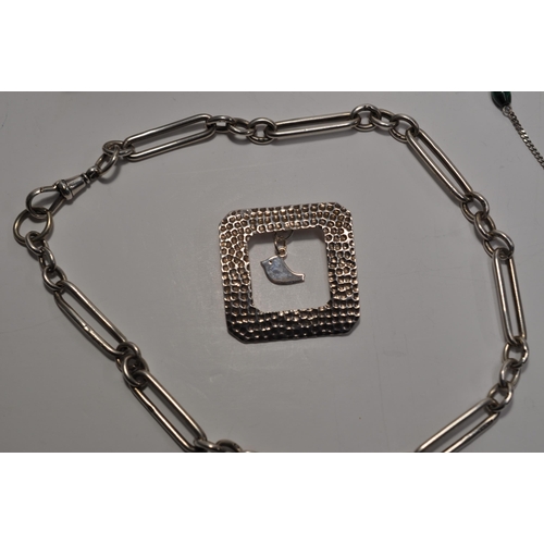 25 - A quantity of silver and white metal jewellery items to include a silver watch chain, necklaces, pen... 