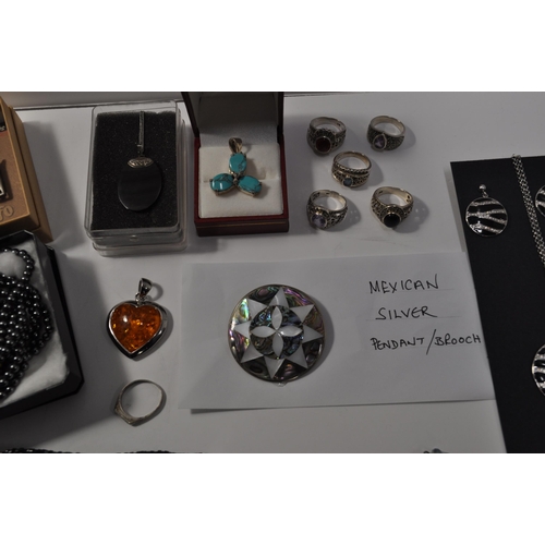 27 - Silver rings and necklaces stamped 925 together with a  selection of modern and vintage costume jewe... 