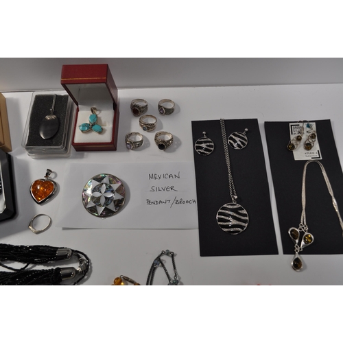 27 - Silver rings and necklaces stamped 925 together with a  selection of modern and vintage costume jewe... 