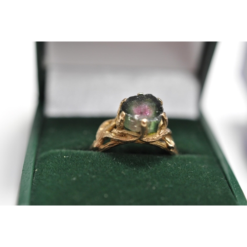 49 - Two 9ct yellow gold rings, one of which holds a watermelon tourmaline? in raised decorative mount A/... 