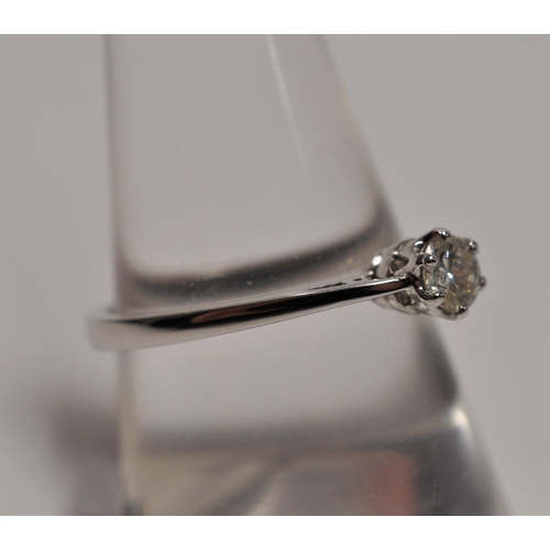 54 - 18ct white gold solitaire diamond ring of approx. 0.25CT, hallmarked 750, approx. size O, approx. gr... 