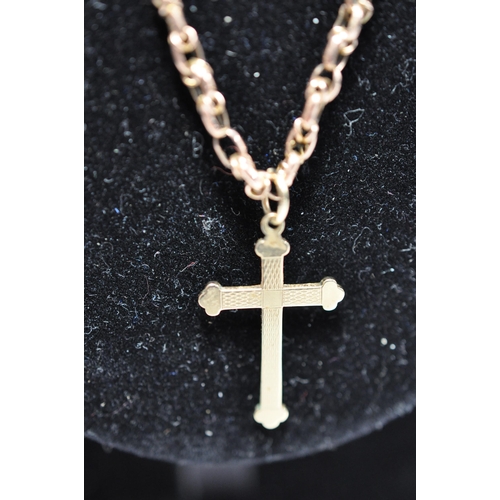 85 - A gold necklace tested as 14ct (9g) with 9ct gold cross (1g) , the Cross pendant is hallmarked Chest... 