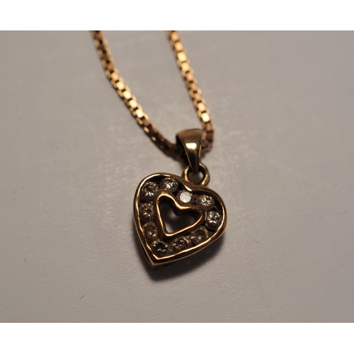 86 - 9ct yellow gold and diamond heart pendant on 9ct gold necklace together with a pair of coordinating ... 