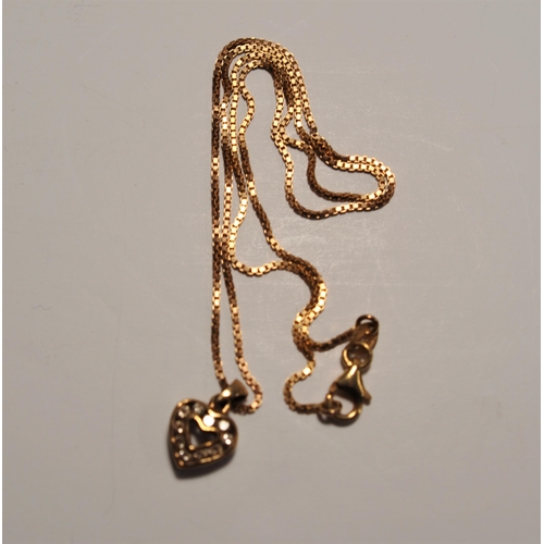 86 - 9ct yellow gold and diamond heart pendant on 9ct gold necklace together with a pair of coordinating ... 